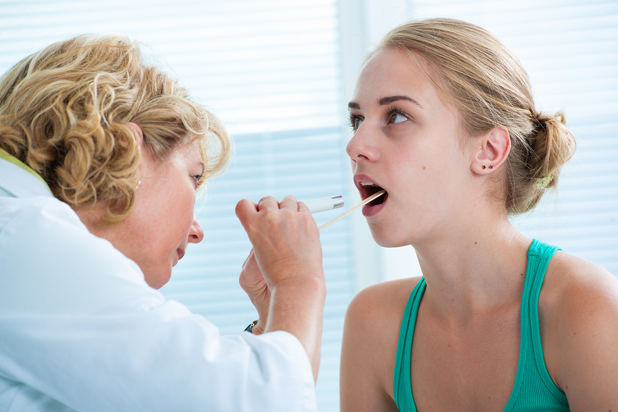 Teen getting a medical exam