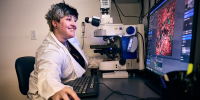Sy Haverlack, CEDAR researcher, examines data on a computer screen.